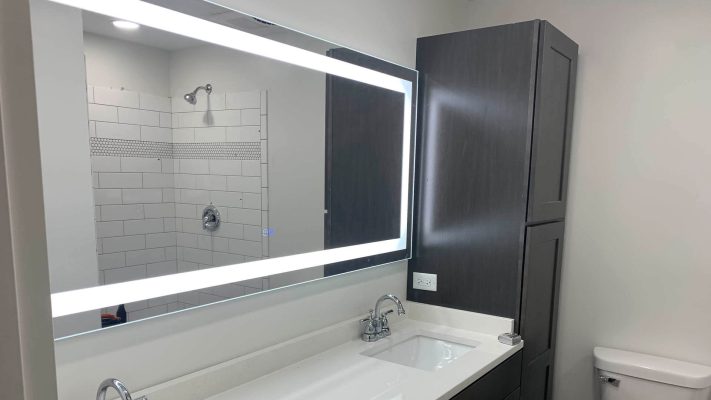 Photo of a bathroom mirror with a built-in LED light