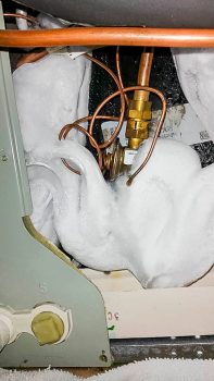 Photo of an evaporator coil frosted over