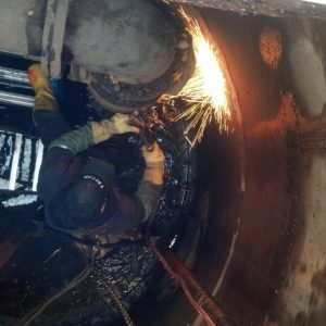 Photo of Ted from Tritan Services performing pipe welding and repair