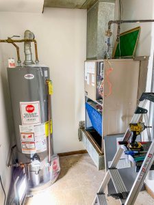Photo of a water heater and furnace after repair and installation